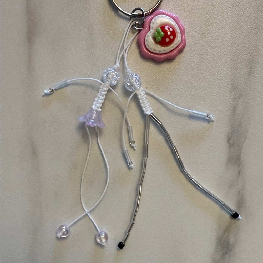 Lovers on a String with a Strawberry Charm – Handmade Keychain
